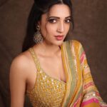 Neha Shetty Instagram - The art of eye contact. Styled by @jukalker Outfit @paulmiandharsh @viralmantra Jewellery @abhilasha_pret_jewelry Photographer @pranav.foto