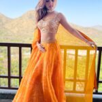 Nidhi Shah Instagram – This colour is everything 🧡 
.
.
Wearing- @arpitamehtaofficial Udaipur – The City of Lakes