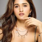 Nidhi Shah Instagram – Style your jewellery in a way to say who you are without having to speak.Everyone can easily find items that reflect their personality and sense of style with the ORRA alphabet and zodiac necklace costing only Rs.20,000. Thanks to ORRA, I am now #CaughtYouByCharm and inspire others to pursue their passions and give their all.

#ORRAjwellery#finejwellery#ADiamonddestination#stacking#rings#bracelets#diamondejwellery#partywear#charms#heart#zodiac#pendants#chains#giftideas#reelitfeelit#momentswithORRA#summerjewellery#goodluckcharms#CaughtYouByCharm#zodiaccharms #alphabetcharms#goodluckcharms

Outfit @ranbirmukherjeeofficial 
Hair by – @hairstoriesbyrishikaa 
Mua – me 🙂