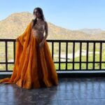 Nidhi Shah Instagram – This colour is everything 🧡 
.
.
Wearing- @arpitamehtaofficial Udaipur – The City of Lakes