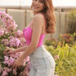 Nikki Tamboli Instagram - Smiles are always in fashion! 💖☺️ . . . . #smile #sunkissed #naturallight #messyhair #nikkitamboli