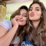 Nikki Tamboli Instagram - Keepin it surreal🥰 . . . . . #casual #casualstyle #casualday #work #setlife #blowdryhair #natural #naturallight #basicmakeup #puppylove 🎥 Mumbai, Maharashtra