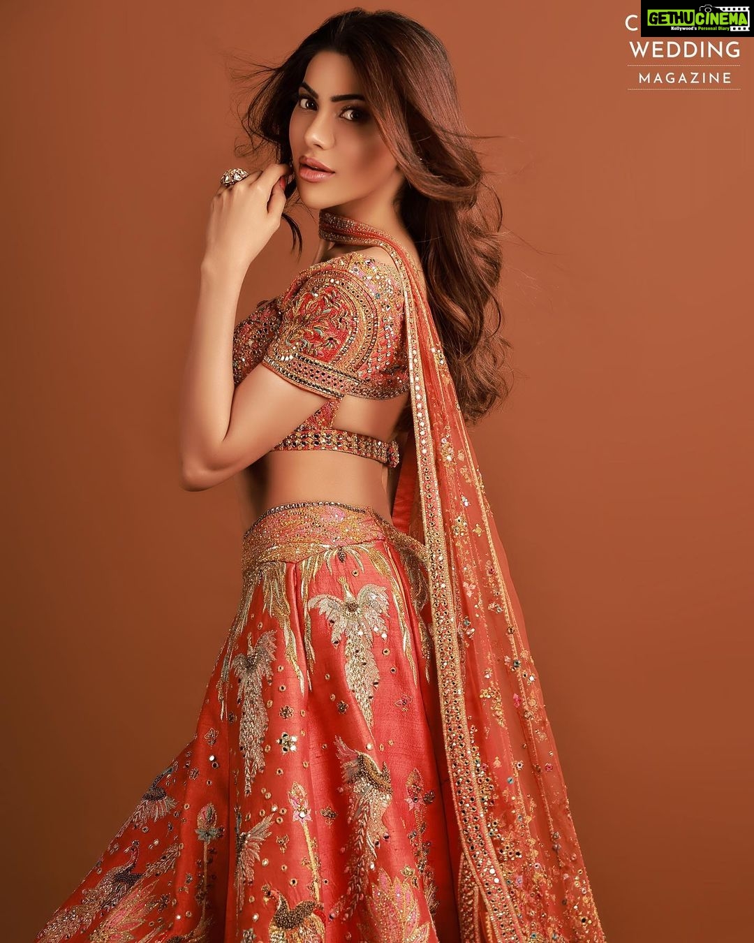 Nikki Tamboli Instagram - “I give’em goosebumps every time🧡 . . Magazine: @culturedwedding Managing Editor: @yadav_manjeet Business Head: @divyanijain1925 Photographer: @amitkhannaphotography Styled by: @stylingbyvictor @sohail__mughal___ Assisted by: @janvijain123 Make-up: @makeupbyrishabk Hair: @hairstylist_jennny Outfit: @sulakshanamonga Jewellery: @nehbynehaparmar Location: @maximusstudiomumbai Artist PR: @shimmerentertainment Co-ordinated by: @nadiiaamalik . . #nikkitamboli #culturedwedding #culturedweddingmagazine