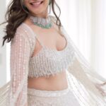 Nisha Agarwal Instagram - Wedding season is officially here! I clearly can’t get enough of this @dishapatilpretcouture Lehenga and the cape just makes it that much more fun to twirl in. The intricate work, the beaded details paired with these gorgeous diamonds from @mahesh_notandass are just perfection.