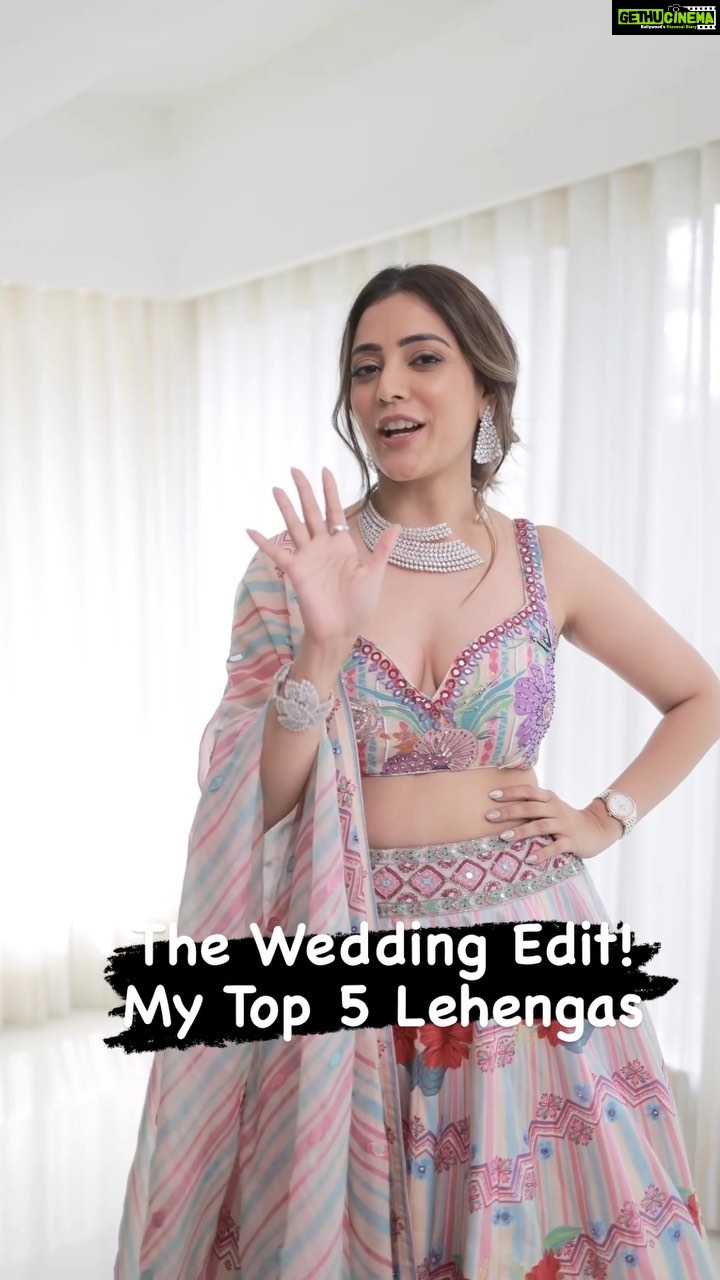 Nisha Agarwal Instagram - Here are my top 5 lehengas for this Wedding season from my go to designers! They are easy, would suit any silhouette and are simply gorgeous. Let me know which one you’d pick in the comments below. Outfits worn: Floral printed lehenga: @awignaofficial Jewelry: @vandalsworld_unofficial Red lehenga: @gopivaiddesigns Jewelry: @vandalsworld_unofficial Orange Lehnga: @paulmiandharsh Jewelry: @mahesh_notandass Green lehenga: @vvanivats Jewelry: @mahesh_notandass White Lehenga: @dishapatilpretcouture Jewelry: @mahesh_notandass #Nishasweddingedit #indianwedding #indianweddinglehenga #lehenga #indianfestivewear #festiveindianwear