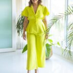Nisha Agarwal Instagram – Embracing the electric energy of neon in this elegant pant suit! 💚✨ 

Wearing @aniclothing.in 
Earrings @varnikaaroraofficiall 
Shoes @hm 

#ColorfulConfidence #neonvibes #summer #summerdressing