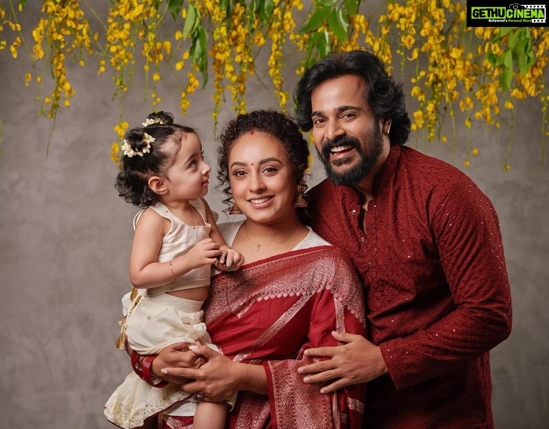Pearle Maaney Instagram - Vishu Umma πΌπ Swipe Right to see Nila Admiring her handsome Dada. π . Click @jibinartist @plan.b.actions Styled by @ashna_aash_ Makeup @rizwan_themakeupboy Jewellery @kallarackalladiescollection Srini wearing @men_in_q_wedding Decor @thegreindale Nails by @nails_by_rakhi