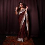 Poornima Indrajith Instagram - Padmavati ki saree ♥️ Got my hands on this gorgeous 40 year old vintage handwoven Benaresi silver border in the rarest hue of cinnamon-brown. Padmavati ki saree is an upcycled version of the original border to an organza base saree styled with zari embroiderey detail on the sleeve. Wardrobe : @pranaahbypoornimaindrajith Jewellery: @pureallure.in Hair : @sajithandsujith Photography: @vishnu__photography___ Team Maxxo: @dayonphotos @rizwanmechoth (@maxxocreative #sustainablefashion #upcycle #conciousfashion #generationrestoration #repeatoutfit ##madeinindia #faahionrevolution #heritagefabrics #benarasisaree #benarasiweaves #pranaahbypoornimaindrajith #benaresisbypranaah #handmade
