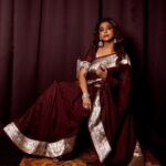 Poornima Indrajith Instagram - Padmavati ki saree ♥️ Got my hands on this gorgeous 40 year old vintage handwoven Benaresi silver border in the rarest hue of cinnamon-brown. Padmavati ki saree is an upcycled version of the original border to an organza base saree styled with zari embroiderey detail on the sleeve. Wardrobe : @pranaahbypoornimaindrajith Jewellery: @pureallure.in Hair : @sajithandsujith Photography: @vishnu__photography___ Team Maxxo: @dayonphotos @rizwanmechoth (@maxxocreative #sustainablefashion #upcycle #conciousfashion #generationrestoration #repeatoutfit ##madeinindia #faahionrevolution #heritagefabrics #benarasisaree #benarasiweaves #pranaahbypoornimaindrajith #benaresisbypranaah #handmade