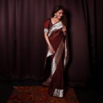 Poornima Indrajith Instagram - Padmavati ki saree ♥️ Got my hands on this gorgeous 40 year old vintage handwoven Benaresi silver border in the rarest hue of cinnamon-brown. Padmavati ki saree is an upcycled version of the original border to an organza base saree styled with zari embroiderey detail on the sleeve. Wardrobe : @pranaahbypoornimaindrajith Jewellery: @pureallure.in Hair : @sajithandsujith Photography: @vishnu__photography___ Team Maxxo: @dayonphotos @rizwanmechoth (@maxxocreative #sustainablefashion #upcycle #conciousfashion #generationrestoration #repeatoutfit ##madeinindia #faahionrevolution #heritagefabrics #benarasisaree #benarasiweaves #pranaahbypoornimaindrajith #benaresisbypranaah #handmade