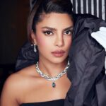 Priyanka Chopra Instagram - An unforgettable Met Gala! Priyanka wore a bespoke Bulgari High Jewelry necklace creation featuring an extraordinary vintage blue diamond, the 1970 Bulgari Laguna Blu, proving the extraordinary ability of Bulgari to craft magnificent jewels with the rarest gifts of nature. The 11.16 carat vintage Bulgari Laguna Blu diamond is the largest blue diamond Bulgari has ever used and the most valuable Bulgari jewel ever to go on sale when it does later this May at Sotheby’s Geneva. Pictures by @nicolasgerardin Video by @f2max Film director @maximsap Filmed by @marty_rush #Bulgari #BulgariHighJewelry #MetGala @sothebys @sothebysjewels New York City
