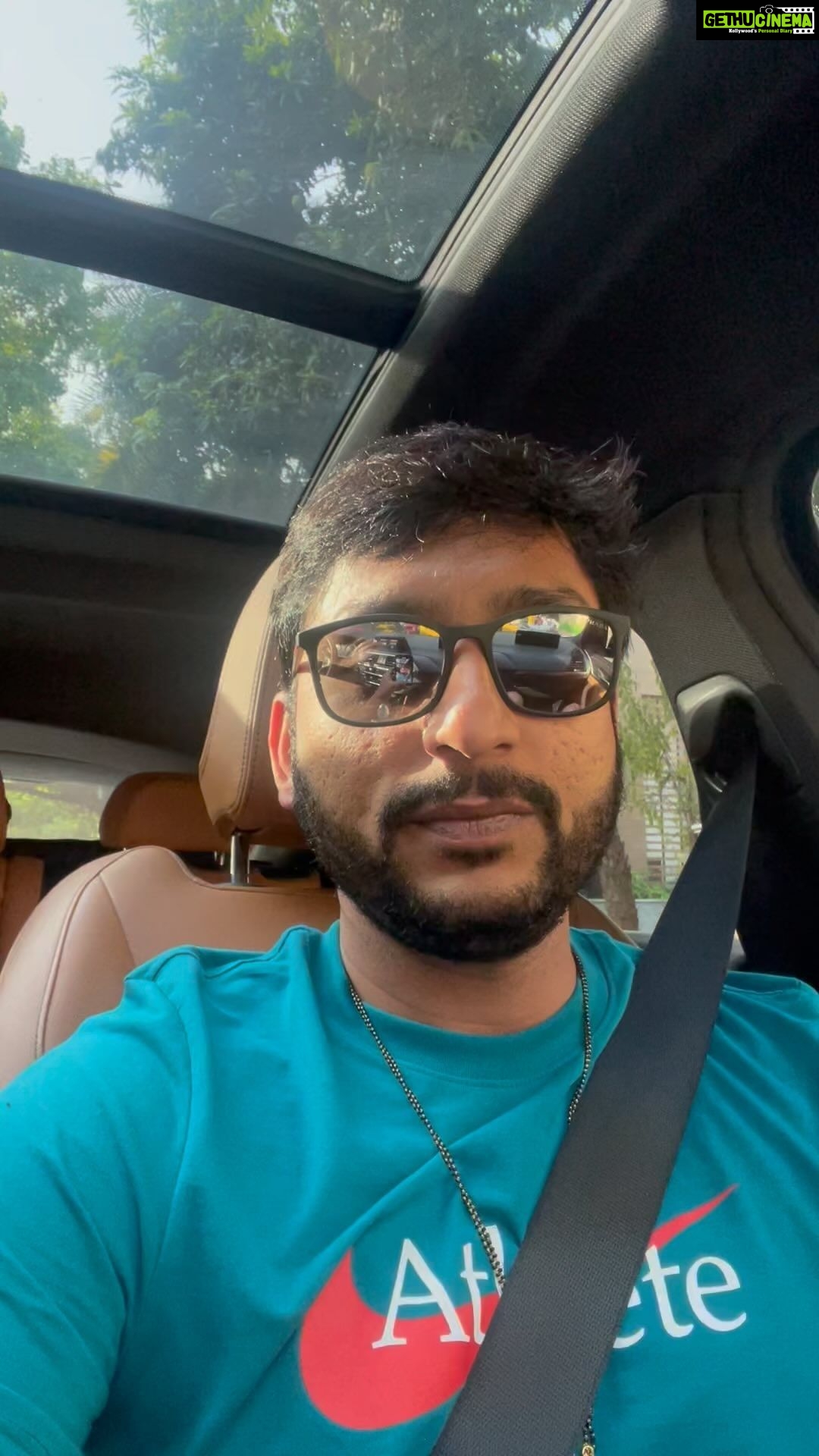 Happy male in sunglasses taking selfie on cellphone while sitting in  automobile on sunny day — person, urban - Stock Photo | #517122980