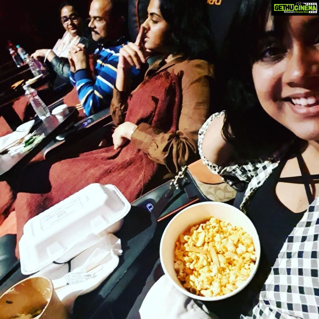 Radha Instagram - Watching movie with family without popcorn and bigscreen nowayyyyyy. #radha #radhanair#familyfirst