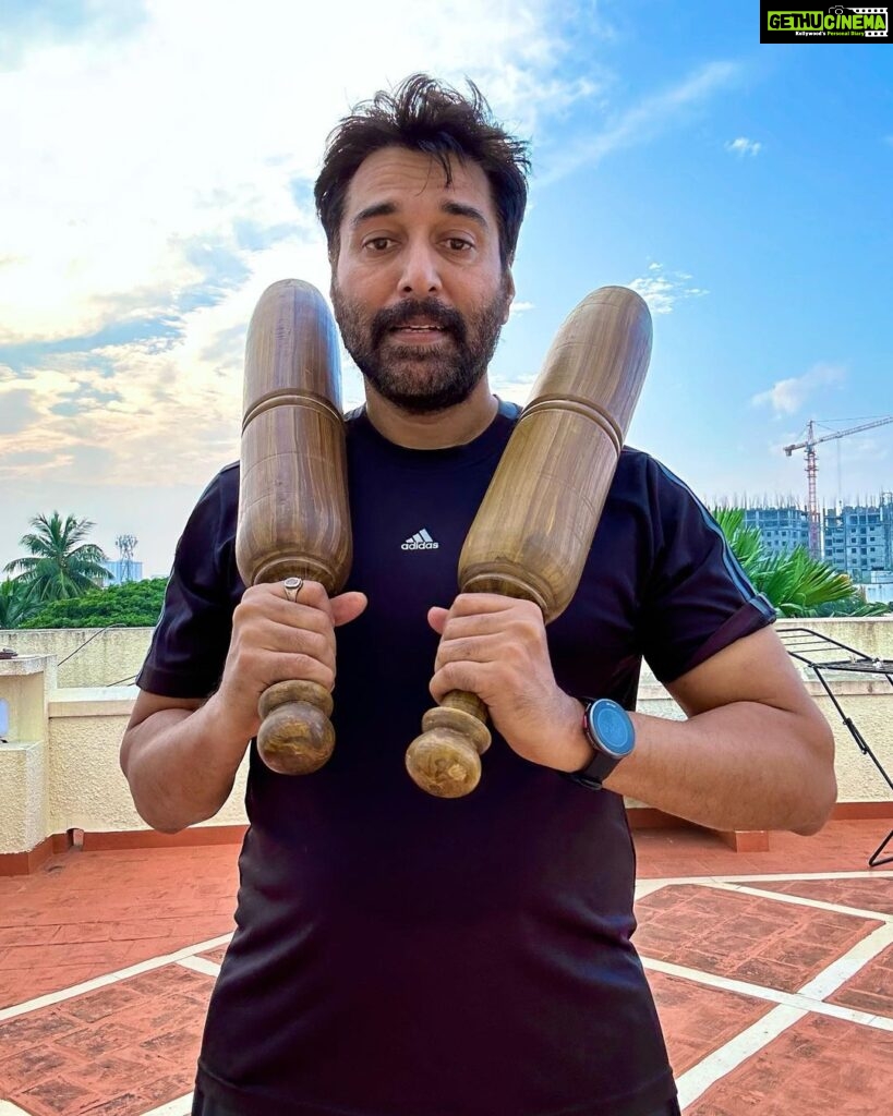 Rahman Instagram - From cycling to Karalakatai. Newly started workout The name Karlakattai has an interesting origin story. It is said that the head of Bootha ganangal who are Shiva's Ganas was Karalan. He is believed to uproot large trees and use the base of these trees as weapons and to exercise. Kattai in Tamil is wood or log. So, the Kattai that Karalan used is called Karlakattai. Chennai, India
