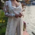 Ranjini Haridas Instagram - Thanks @madlycandid for these lovely last minute clicks ..I love them !!!❤️❤️❤️ As always my hair and makeup was done by my darling @jaan_moni_das . The outfit was conceptualised by yours truly and custom made by @saltstudio ..thanks you guys for doing a fab job ❤️ #weddingwear #christiancivilceremony #white #jacket #cowlneck #palazzo #indowestern #comfortchic #eveningvibes #alleppey #wedding #marriage #indianwedding