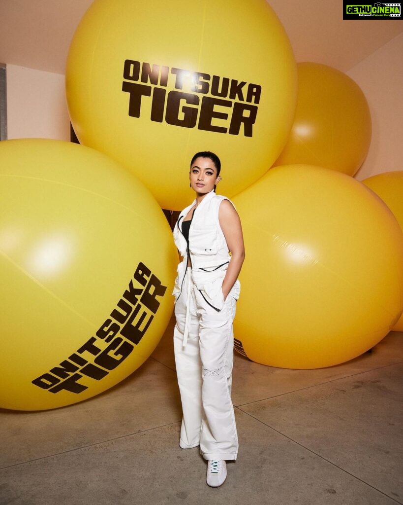 Rashmika Mandanna Instagram - Here’s to new beginnings !! Ecstatic to announce that I am now India’s first brand advocate for the iconic Japanese fashion brand, Onitsuka Tiger!! 🥰🥰🌸🌸 Their contemporary collections seamlessly blend fashion and sports while incorporating heritage and innovation. I had the pleasure of attending the brand’s Autumn/Winter 2023 showcase at Milan Fashion Week, where I wore a stunning head-to-toe look from the collection. Stay tuned for more from Onitsuka Tiger and me! #OnitsukaTigerOfficial #OnitsukaTiger #OnitsukaTigerindia #MilanFashionWeek #Partnership