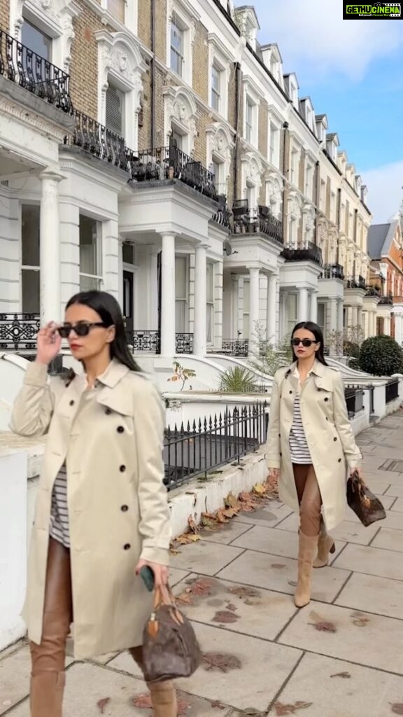 Roshni Chopra Instagram - Trench coats have entered the chat 🧥❤️ Trench @burberry Striped knit @hm Leather leggings @zara Boots @mango #ootd #autumnfashion #winterstyle #london #shotoniphone14pro
