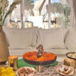 Roshni Chopra Instagram - Here are 3 tips for a FESTIVE TABLESCAPE🪔❤️✨ - 1. play around with different heights using glasses as stands 2. Use different sizes of crockery instead of symmetry to create visual interest . 3. Add a living elements - flowers leaves plants make the table come alive #Rohome loves sustainable decor and the best place to find it is in your own homes ❤️ tell us how you likes this idea and if you’d try this at home ((ps you can use any plates and glasses they don’t have to be kansa ! #homedecor #festivedecor #diwali #tablescape #kansa #decor