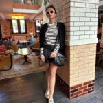 Roshni Chopra Instagram – Euro trip #capsulewardrobe 🧥🫶
👟@newbalance 574’s (on all looks)
👜 @balenciaga (on most looks )

Look 1 –
Shorts @stradivarius 
Blazer- @massimodutti (men’s)
Tank – @arketofficial 
Sunnies @jimmyfairly 

Look2 – 
Stripe tee – @arketofficial 
Jacket – @massimodutti 
Sunnies – @acnestudios 

Look 3 
Pants – @mango 
Tee – @arketofficial 
Bag – @ysl 

Look 4 & 5 
Skirt @mango 
Top @hm
Cashmere knit @mango 
Trench – @burberry 

Look 6 
Pants @hm 
Stripes cardi- @massimodutti 
Sunnies @jimmyfairly 

Look 7
Coords @shahinmannan 
Sunnies @acnestudios 

#rovive #rostyle #capsulewardrobe #holidaylook #europetravel #rowardrobe