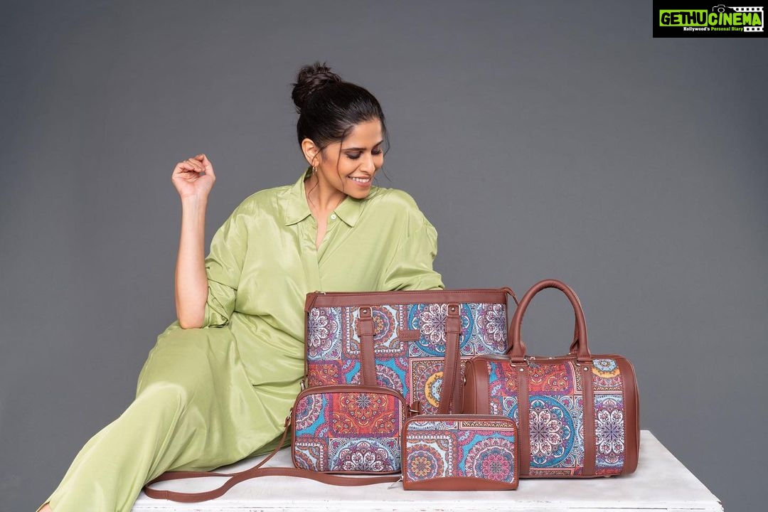 Sai Tamhankar Instagram - Bags are a girl's best friend! Anyone who says otherwise doesn't own the right kind of bag. Thank God for me, I found Zouk. Their Indian-inspired designs and incredible quality is the first thing you notice about their bags. Zouk's products are 100% vegan, made from handcrafted fabric, and have an aesthetic appeal that goes with your entire wardrobe. You won't find such an amazing collection of modern convenience and traditional designs anywhere else. Use my coupon code 'SAIE15' to avail 15% off on your Zouk purchase, today! #saitamhankar #ZoukBags #crueltyfree #vegan #handcrafted #authenticallyyou #indian #emotion #handcraftedwithlove #handicraft #handmade #proudlyindian #proudbuthumble #classic #footwear #shoes #bags #wallets #IndianClassic #NewLaunch #ProudlyIndian #UnapologeticallyIndia #CrueltyFree #Vegan #Proudbuthumble #Handcraftedgifts #gifting