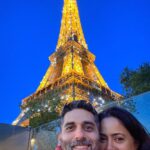 Sameera Reddy Instagram - We visited the Eiffel Tower on our honeymoon in 2014 & now we are back here with plus 2 🥳 It’s really such a marvel how they built this structure in 1889!! We had an early dinner at @madamebrasserietoureiffel restaurant which has an amazing sightseeing view of Paris ( I recommend the 6.30 pm seating because it is just perfect to see the sunset ) and after some incredible courses and my fav being the dessert 😜 we headed up to the sommet ! The kids were really thrilled to see all of Paris from the top ! And I always can’t get over how stunning the glittering lights of the Eiffel Tower are when they come on at 10 pm ! It’s really worth waiting for ❤️💫🇫🇷 #travelwithkids #messymama #motherhood #momlife @madamebrasserietoureiffel @toureiffelofficielle @explorefrance #MadameBrasserie #RestaurantParis #TourEiffel #ThierryMarx #eiffelofficielle #ExploreFrance Eiffel Tower - Paris, France