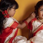 Sandra Thomas Instagram - April girls 📷:@pournami_mukesh_photography Outfit : @meenumjoseph Stylist : @joe_elize_joy Curator: @nivethithasanjay Assisted by : @sanliya_sabu Makeup : @zara___makeover Blouse stitched by : @edesignsbythasneem #birthdaytheme #traditionalwear #bengali #thankakolusu #supernaturalfamily #family #influencer #filmproducer #toddlerlife #twins #girls #lifeline #youtubers #grandchildren #daughters #lovequotes Maxxo Creative