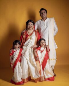 Sandra Thomas Instagram - It’s our birthday as parents to this beautiful angels 😇 📷: @pournami_mukesh_photography Outfit : @meenumjoseph Stylist : @joe_elize_joy Curator: @nivethithasanjay Assisted by : @sanliya_sabu Makeup : @zara___makeover Blouse stitched by : @edesignsbythasneem #birthdaytheme #traditionalwear #bengali #thankakolusu #supernaturalfamily #family #influencer #filmproducer #toddlerlife #twins #girls #lifeline #youtubers #grandchildren #daughters #lovequotes Maxxo Creative