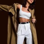 Scarlett Mellish Wilson Instagram - Posted @withregram • @blackburdofficial Back by popular demand • stunning @scarlettwilsonofficial wearing The Lois Trench Coat ❤️ Available now on our website London, United Kingdom