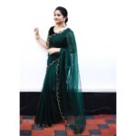 Shafna Instagram - Wearing my all time favourite @jazaashdesignstudio ‘s Dark Green Soft Organza saree♥️ Tganks a lot Jesitha for sending this beauty within a short time period!!! I love you♥️ @jazaashdesignstudio Accessorised by everyone’s favourite @pureallure.in Thankyou so much di for this prettiest earrings 🤩 Clicked by my darlo @aashiq.aashii @the.spark.stories 😎