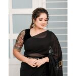 Shafna Instagram - “Makeup” your mind to face all the phases of life!!! Be internally strong like solid “Black”!!! Wearing a black georgette saree with beautifully handworked velvet blouse along with a belt…. Designed within minimal time by @jazaashdesignstudio ♥️ Makeup by @maquilleurbysumi ♥️ Photography @jaison_jac_photographer ♥️ Earring @pureallure.in ♥️ #black #blacksaree #blackvelvetblouse #handworkedblackblouse #handworkedblouse #sareewitbelt #designedwithlove #jazaash #jazaashdesignstudio #maquilleurbysumi #makeupartist #jaisonjacphotography #photographer #pureallure #jewellerydesigner #favouriteteam #teamwork #paysoff #shafna #shafnanizam #shafnasajin