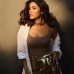 Shehnaaz Kaur Gill Instagram - ⭐️⭐️⭐️⭐️⭐️ Skirt by : @nadinemerabi Bracelets by : @misho_designs Heels by : @publicdesire Styled by : @manekaharisinghani Style with @chintan_shah08 📷 @shreyansdungarwal