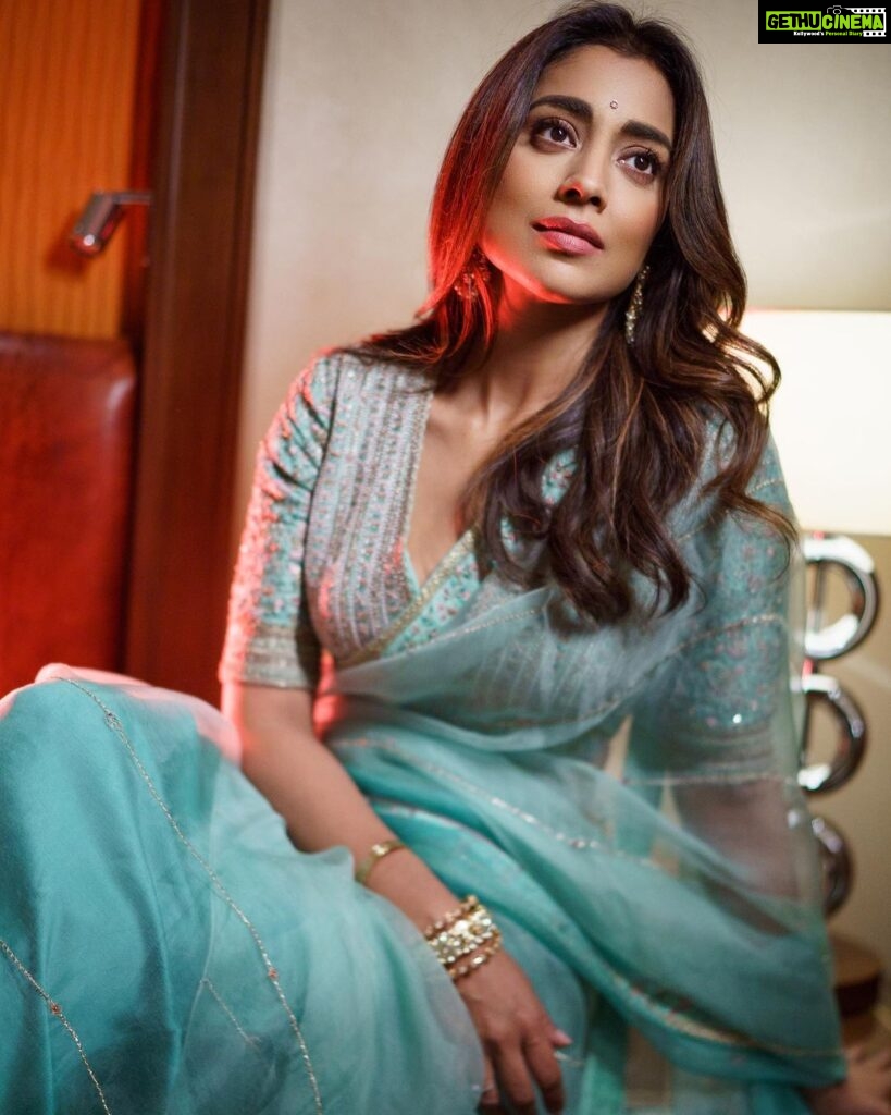 Shriya Saran Instagram - Shot with the amazing @deepak_vijay_photography he makes pictures look like a painting . You are an artist . Thank you @ajshetty for connecting us Wearing @sithara_kudige mint green saree . @kabzaamovieofficial @makeupbymahendra7 @priyanka_sherkar1 Jwellery @kushalsfashionjewellery