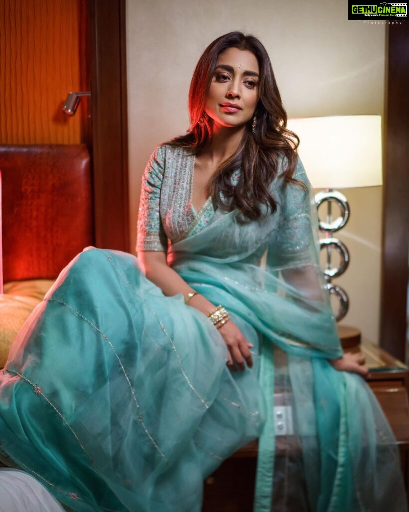 Shriya Saran Instagram - Shot with the amazing @deepak_vijay_photography he makes pictures look like a painting . You are an artist . Thank you @ajshetty for connecting us Wearing @sithara_kudige mint green saree . @kabzaamovieofficial @makeupbymahendra7 @priyanka_sherkar1 Jwellery @kushalsfashionjewellery