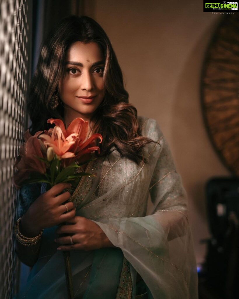 Shriya Saran Instagram - Shot with the amazing @deepak_vijay_photography he makes pictures look like a painting . You are an artist . Thank you @ajshetty for connecting us Wearing @sithara_kudige mint green saree . @kabzaamovieofficial @makeupbymahendra7 @priyanka_sherkar1 Jwellery @kushalsfashionjewellery