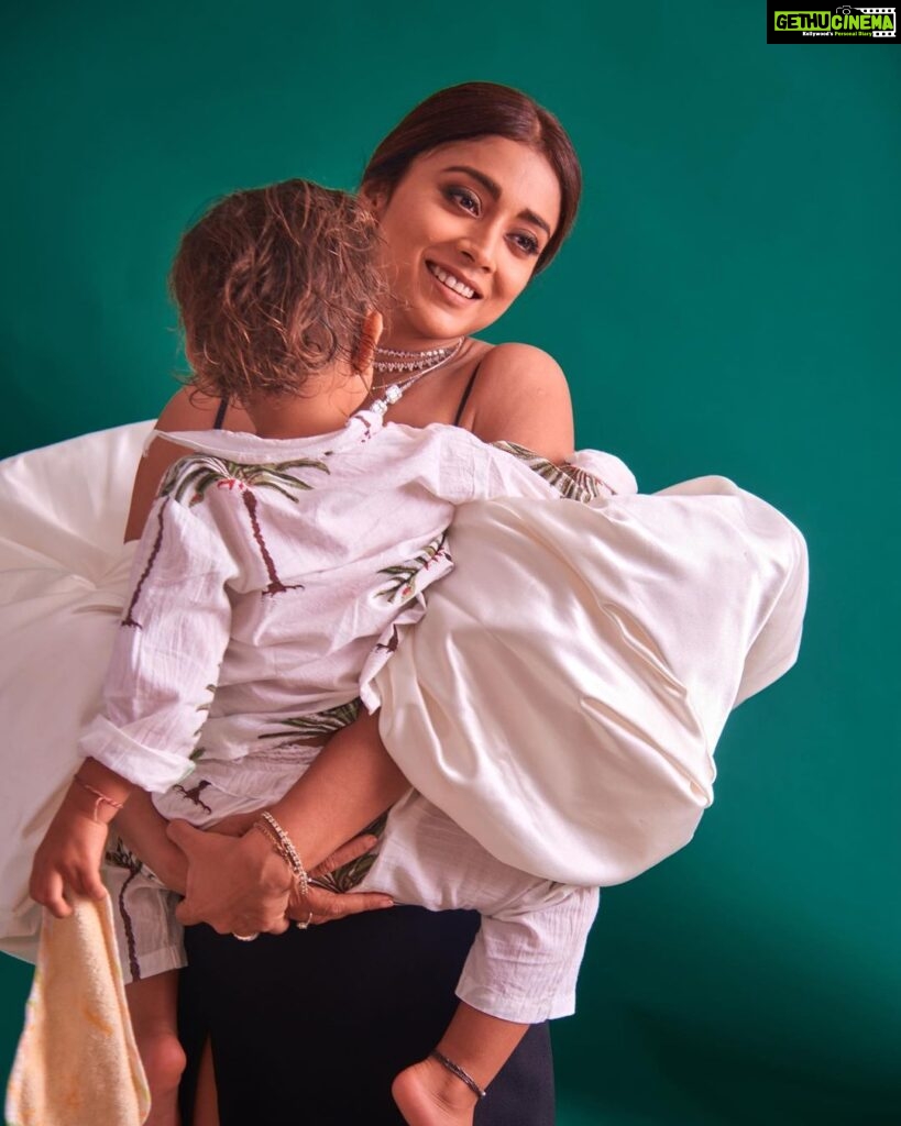 Shriya Saran Instagram - She says , Mama no shooting please … book mama . Let’s read and sleep I tell her , Radha come for a picture , she says …. Okie mama . Then she tells me I love you ❤️ My heart goes 💗 With Radha , with love Outfit: @markbumgarner Jewellery: @karishma.joolry Styled by: @sukritigrover Styling Team: @simrankumar19 @vanigupta.23 Make up @sakpalnilesh267 Hair @yogitasheth96