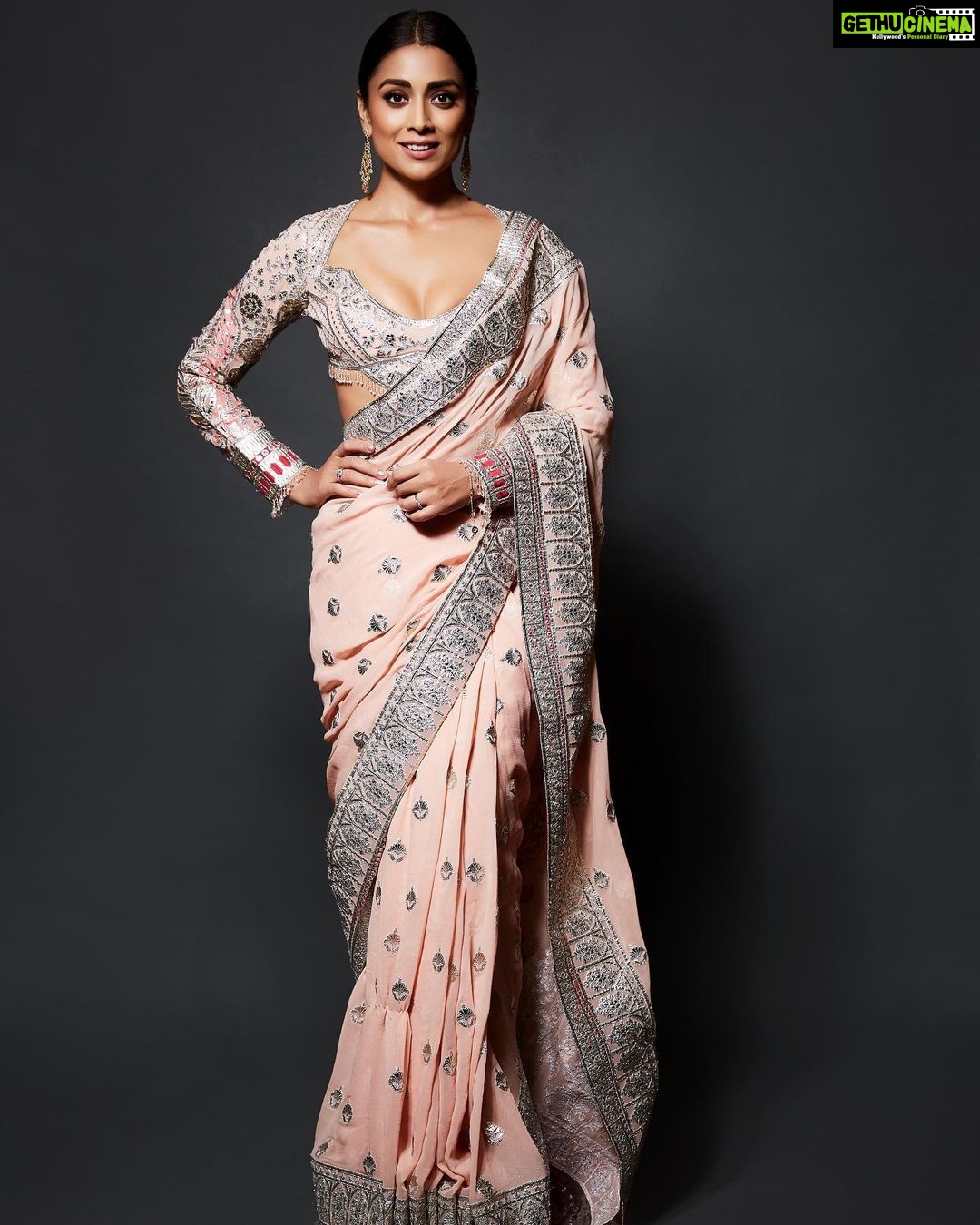 Shriya Saran Instagram - Thank you @falgunishanepeacockindia for this absolutely amazing saree for @kabzaamovieofficial movie music launch Thank you @rchandrumovies for making me part of your vision Thank you @nimmaupendra for being so so amazing in the movie and so so fabulous in real life . Photographer @venurasuri Make up @makeupbymahendra7 Hair @priyanka_sherkar1 @media9manoj