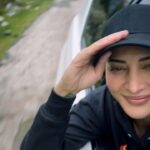 Shruti Haasan Instagram – The crisp air the grey skies and the green and flowers have made my heart so happy 💜 #solotravel #peaceandquiet