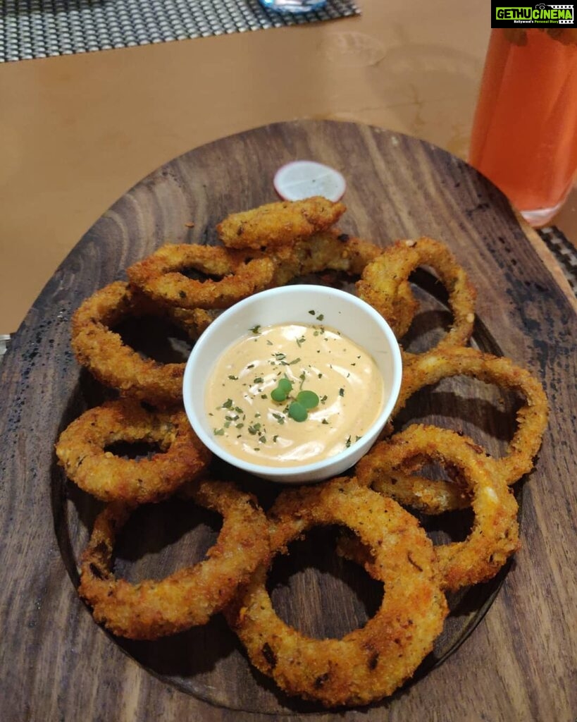 Siddhi Mahajankatti Instagram - • Thank you @butterartisancafe for having me over❤️ The food was finger licking yummm ❤️ All the very best @surumi_nb and really proud of your husband for supporting your goals! Head over to @butterartisancafe and have these : - Pink lemonade - Onion rings (This is my personal favorite) - Pineapple feta cheese salad ( This was finger licking yum) - Mushroom stroganoff (This filled my tummy )• PS : Swipe to see the food pictures 😋 Butter Artisan Cafe