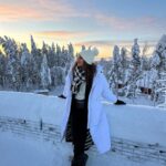 Sonakshi Sinha Instagram - I dont care what you say… Santa Claus is real!!! I crossed over to the arctic circle, I met him… and some reindeers, and i made snow angels for the first time, ice skated for the first time, went hunting for the northern lights and came back with some amazing pictures of me with the moon 😂, ate food in a glass igloo, went partying in an empty nightclub made of ice, rode a snowmobile for the first time… its so cold but how am i melting??? Rovaniemi i love you ❤️ @ourfinland @visitrovaniemi @beyondarctic @santaclausoffice @snowmanworldlapland @santaclausholidayvillage @thetravelbusco #visitfinland #visitrovaniemi