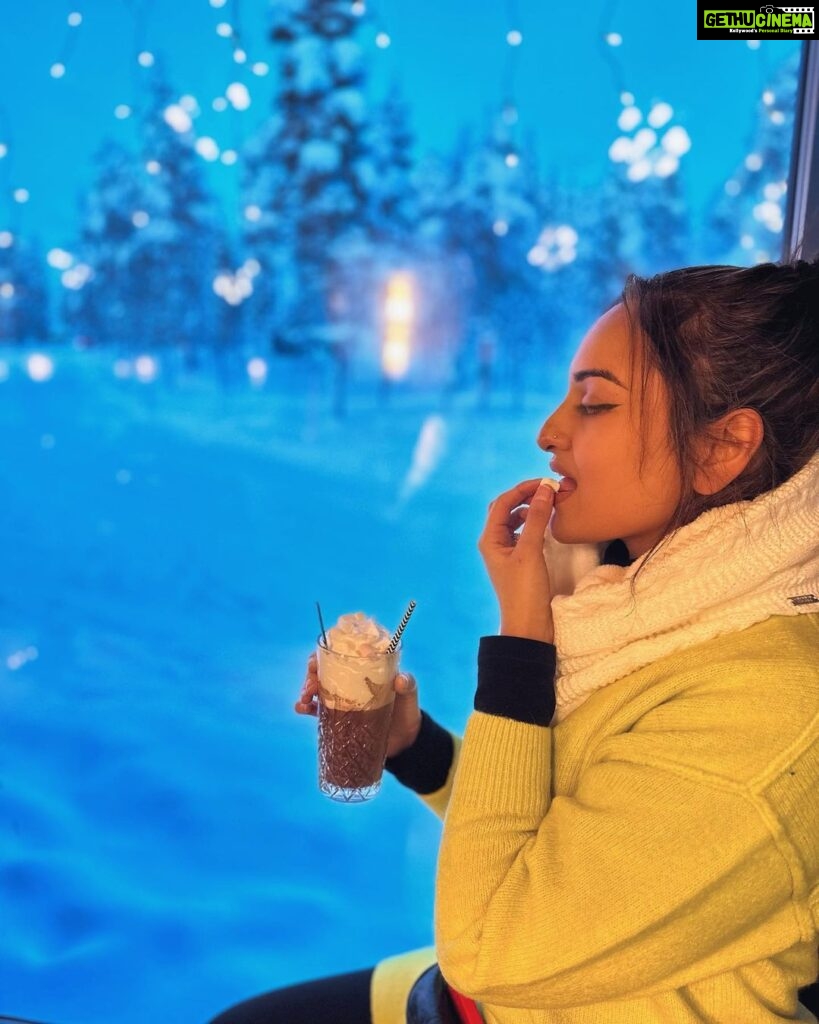 Sonakshi Sinha Instagram - For a person who hates the cold, @northernlightsvillage in @ourfinland has sure changed my mind! What a surreal experience feeling snow for the first time ever…looking at the stars from inside my aurora cabin, going husky sledging in the vast white expanse, chasing the northern lights and lighting a bonfire in the middle of nowhere, roasting marshmallows, drinking hot chocolate oh and freezing myself at -14 degrees only to get into a hot tub… Saariselka you have my ❤️ #VisitFinland Northern Lights Village Saariselkä
