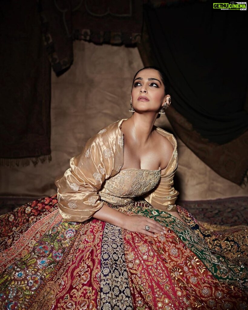 Sonam Kapoor Instagram - Wearing and representing my fairy godfathers @abujanisandeepkhosla who were the first people to ever dress me for my very first appearance. This lehenga is also seen at the fabulous @nmacc.india It has 20 unique panels of embroidery representing 25 years of the brilliant @abujani1 and @sandeepkhosla . Love you both ❤️ Style @rheakapoor @abhilashatd Earrings @amrapalijewels Beauty @namratasoni Hair @bbhiral 📸 @thehouseofpixels BKC