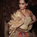 Sonam Kapoor Instagram - Wearing and representing my fairy godfathers @abujanisandeepkhosla who were the first people to ever dress me for my very first appearance. This lehenga is also seen at the fabulous @nmacc.india It has 20 unique panels of embroidery representing 25 years of the brilliant @abujani1 and @sandeepkhosla . Love you both ❤️ Style @rheakapoor @abhilashatd Earrings @amrapalijewels Beauty @namratasoni Hair @bbhiral 📸 @thehouseofpixels BKC