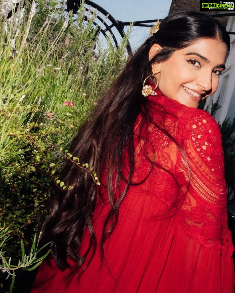 Sonam Kapoor Instagram - My two beautiful boys, friends, cake, champagne, oysters, caviar and the perfect summer day! What more can a girl in red dress ask for her birthday. Thank you to everyone who wished me and to the universe for giving so bountifully. #everydayphenomenal #vayusparents #9thjune #gemini #birthdaygirl Notting Hill, London