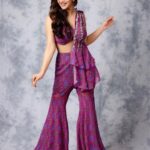 Sreeleela Instagram - How first day of #dhamaka promotions looked like💜 . . . . Styled by @rashmitathapa Wearing @rachitkhannaofficial Jewellery @spillthebead Styling team @aishwarya128 @__.gunjan.__ Shot by @pranav.foto