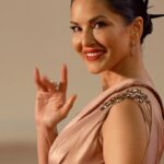 Sunny Leone Instagram – Behind every gorgeous #Cannes look was a full glam session.  #SunnyLeone took us behind the scenes of the #Kennedy premiere and now we really need some eye patches. See more of the best #Cannes2023 looks at the link in bio.
