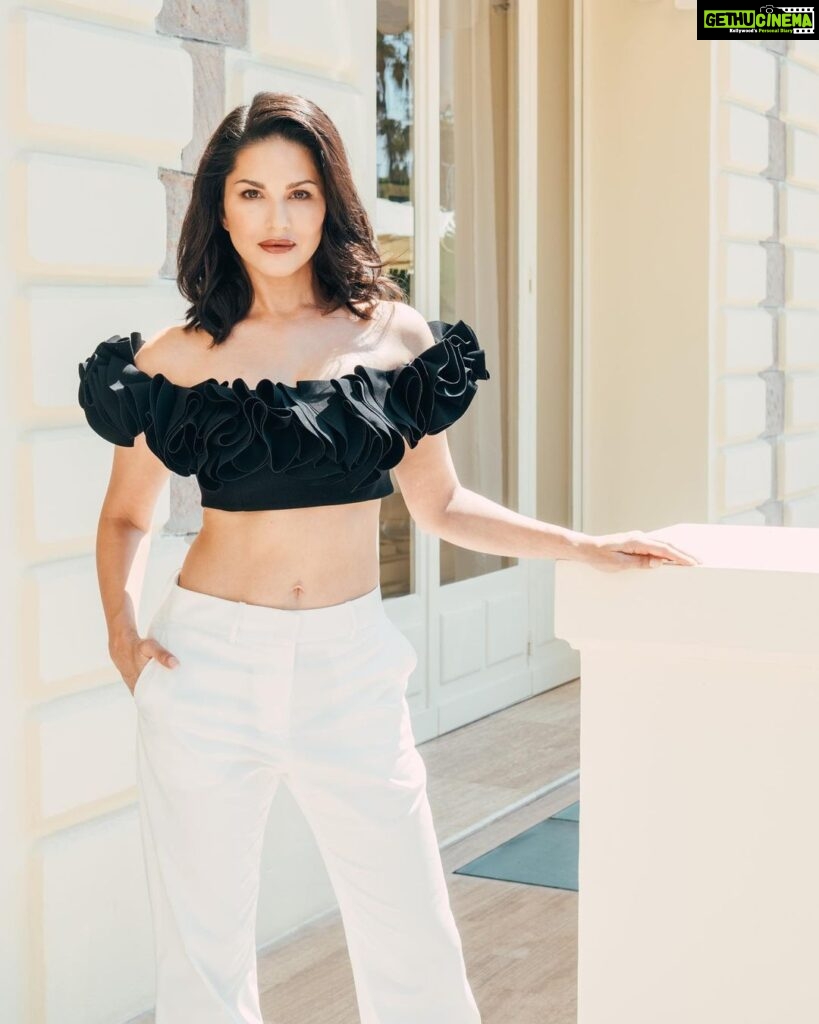 Sunny Leone Instagram - Hello day 2 of press for #Kennedy Love this look styled by @ilya.vanzato Top @gemymaalouf Pant @bcbgmaxazria Hair and make up @tomasmoucka Photography @tomasmoucka @anuragkashyap10 @zeestudiosofficial @goodbadfilmsofficial . . #SunnyLeone #SunnyLeoneAtCannes #KennedyAtCannes @festivaldecannes Cannes, French Riviera, France