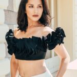 Sunny Leone Instagram - Hello day 2 of press for #Kennedy Love this look styled by @ilya.vanzato Top @gemymaalouf Pant @bcbgmaxazria Hair and make up @tomasmoucka Photography @tomasmoucka @anuragkashyap10 @zeestudiosofficial @goodbadfilmsofficial . . #SunnyLeone #SunnyLeoneAtCannes #KennedyAtCannes @festivaldecannes Cannes, French Riviera, France