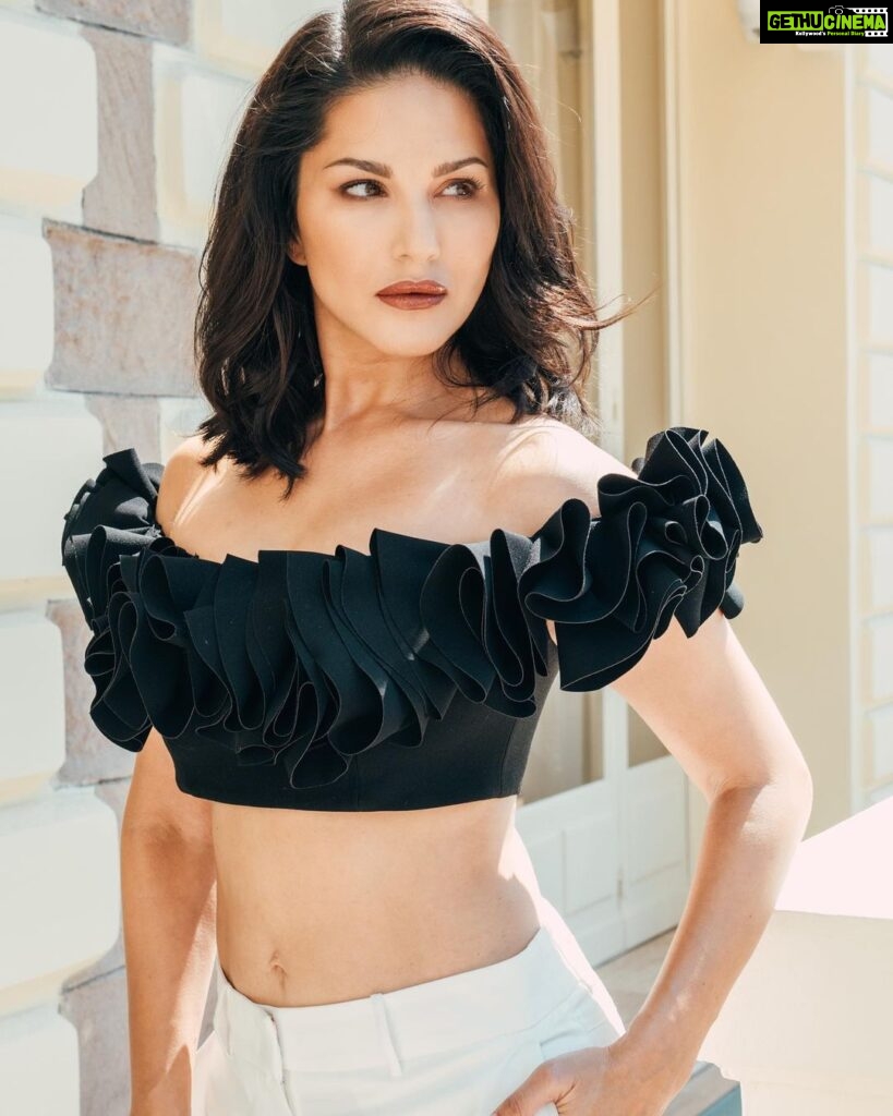 Sunny Leone Instagram - Hello day 2 of press for #Kennedy Love this look styled by @ilya.vanzato Top @gemymaalouf Pant @bcbgmaxazria Hair and make up @tomasmoucka Photography @tomasmoucka @anuragkashyap10 @zeestudiosofficial @goodbadfilmsofficial . . #SunnyLeone #SunnyLeoneAtCannes #KennedyAtCannes @festivaldecannes Cannes, French Riviera, France