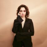 Tamannaah Instagram - If you do what’s Suit-able, you’ll be at sheer peace 🤵🏻‍♀️🤵🏻‍♀️🤵🏻‍♀️ Thank you @realbollywoodhungama for the Most Stylish Trendsetter Award Outfit: @gretelz.milano Jewels: @herstoryjewels Footwear: @louboutinworld Stylist: @lakshmilehr Styling team: @gaurvivdesai Hair: @tinamukharjee assisted by @palashipramanik Makeup: @kirandenzongpa assisted by @karchung_gurung_ Photographer: @kadamajay
