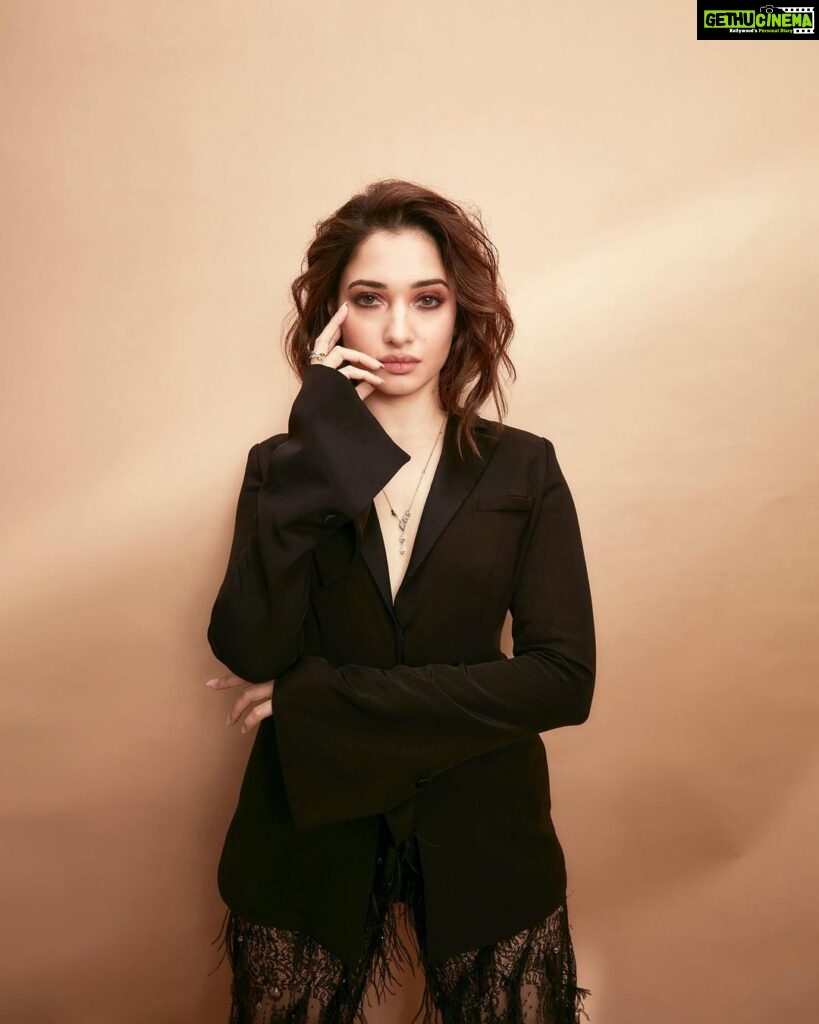 Tamannaah Instagram - If you do what’s Suit-able, you’ll be at sheer peace 🤵🏻‍♀️🤵🏻‍♀️🤵🏻‍♀️ Thank you @realbollywoodhungama for the Most Stylish Trendsetter Award Outfit: @gretelz.milano Jewels: @herstoryjewels Footwear: @louboutinworld Stylist: @lakshmilehr Styling team: @gaurvivdesai Hair: @tinamukharjee assisted by @palashipramanik Makeup: @kirandenzongpa assisted by @karchung_gurung_ Photographer: @kadamajay